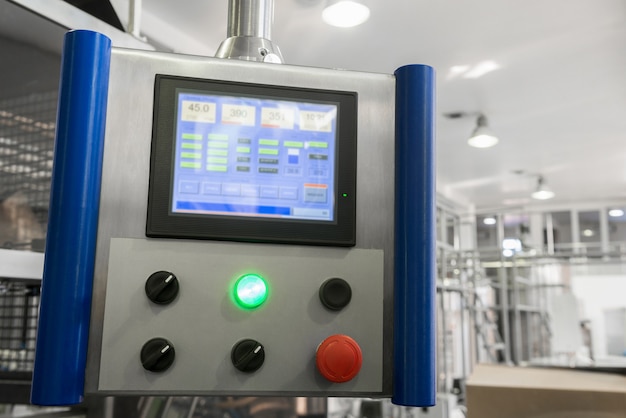 Control panel with display at the factory, close-up