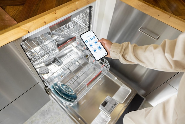 Controlling dishwasher with smart phone application