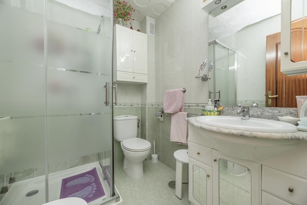 Conventional bathroom complete with sink cabinet