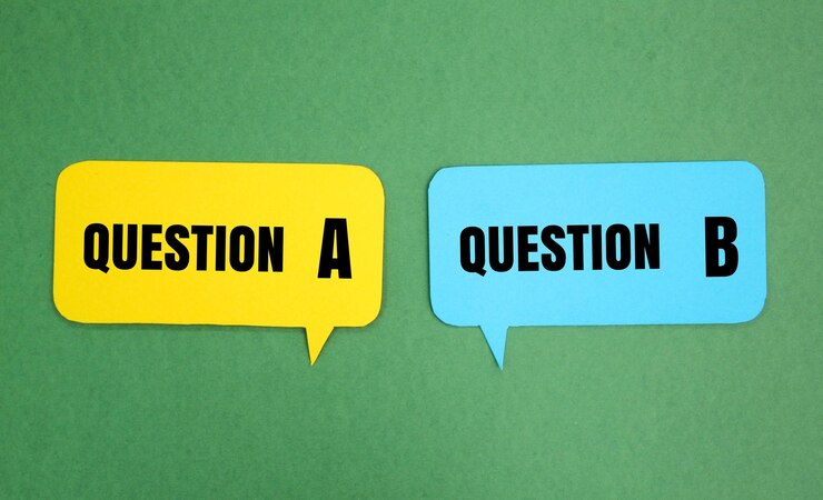फोटो conversation bubbles with the words question a and question b the concept of education