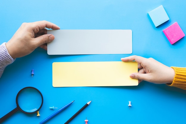 Conversation talk or word of mouth concepts with male hand holding blank paper.copy space