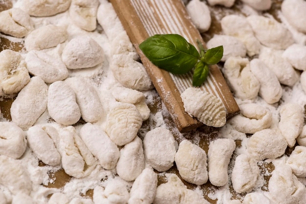 Cook handmade gnocchi on the table Italian tradition