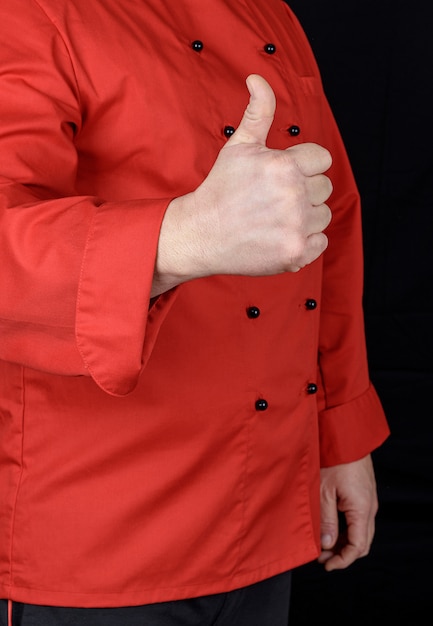 Cook in red shows gesture like