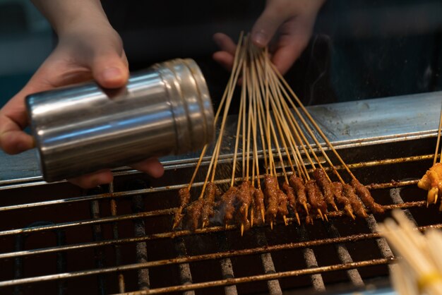 The cook Roasted Beef Kebabs on the grill