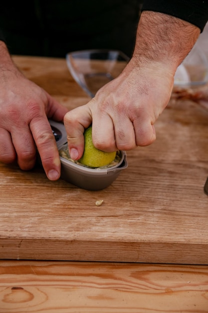 Cook survives lemon juice on wooden table