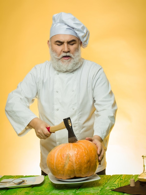 Cook with axe and pumpkin