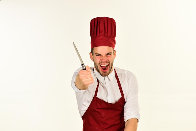 Cook works in kitchen Chef with mad yelling face