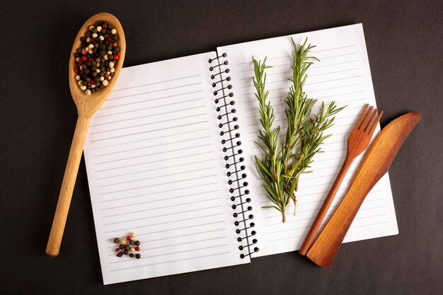 Cookbook with ingredients on the tableRecipe book