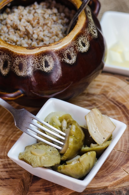 Cooked buckwheat in a clay pot