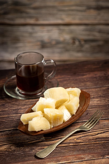 Cooked cassava served on plate on the table