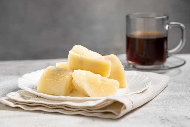 Cooked cassava served on plate on the table