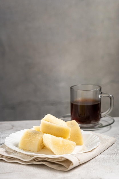 Cooked cassava served on plate on the table