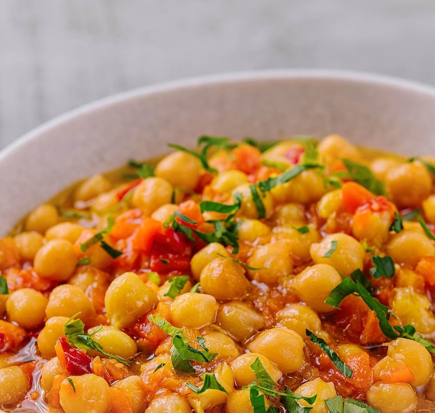 Cooked chickpeas in a white bowl