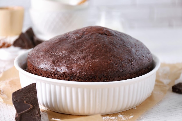 Cooked chocolate pie in a baking tray on a table