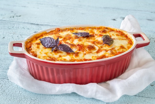 Cooked Eggplant Parmigiana In Baking Pan Close-up