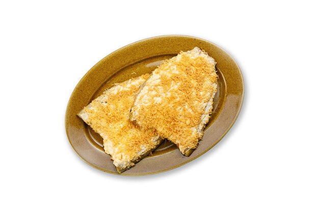 cooked fish on a plate on a white background