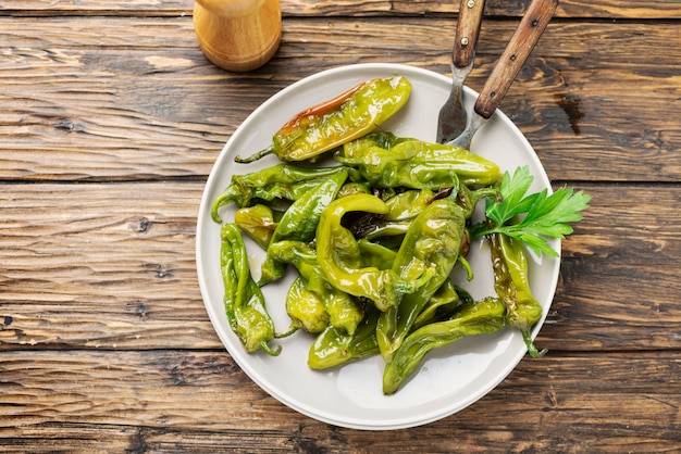 Cooked green sweet italian pepper