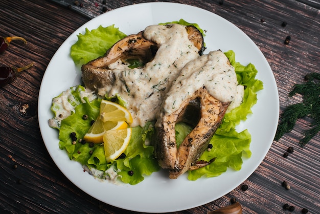 Cooked red fish dish with cream sauce