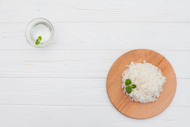 Cooked rice on board with water 