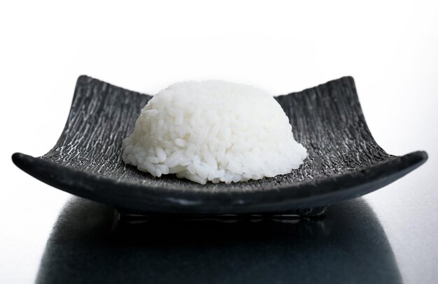 Cooked rice on grey background