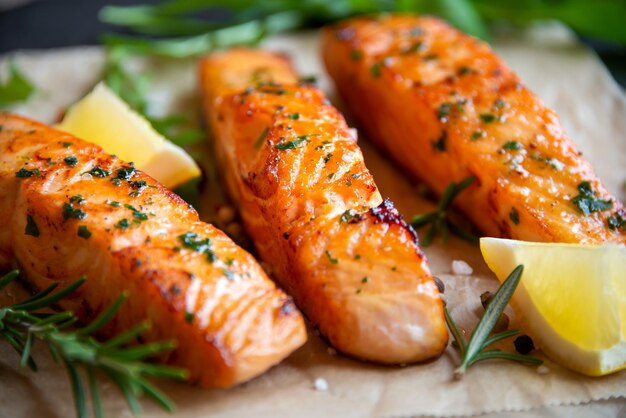 Premium Photo | Cooked salmon fish fillet with lemon and rosemary