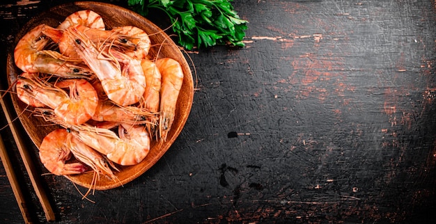 Cooked shrimp in a plate with parsley