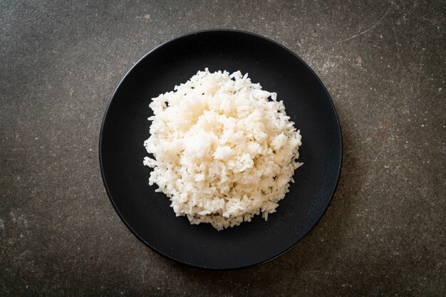 Photo cooked thai jasmine white rice on plate