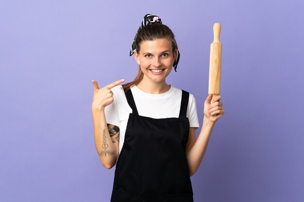 Cooker Slovak woman isolated on purple background giving a thumbs up gesture