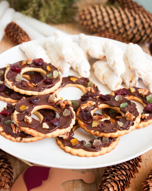 Photo cookies chocolate sable and kifli in a christmas decoration.