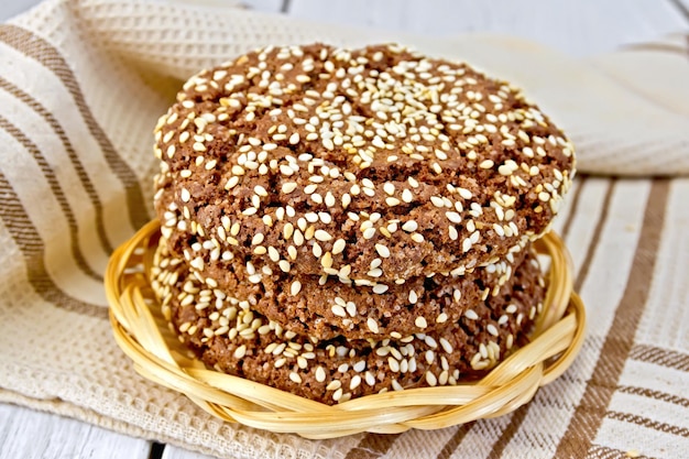 Cookies chocolate in wicker plate on board