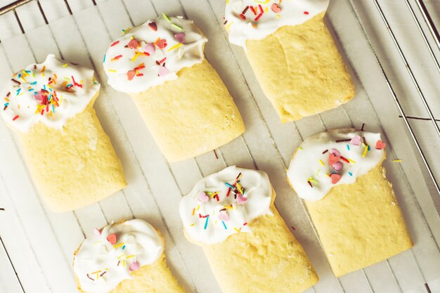 Cookies in the form of Easter cakes, decorated with whipped whites 