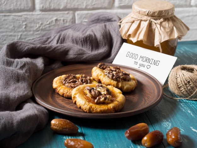 cookies, honey and dates with a white card for the inscription.