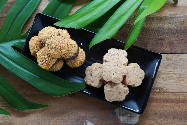 Cookies on a plate with decoration for hari raya taken from above