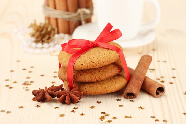 Cookies for Santa: Conceptual image of ginger cookies, milk and christmas decoration on light background