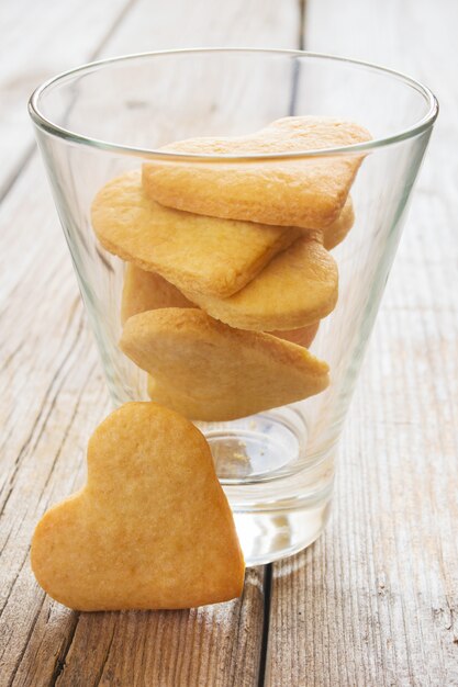 Cookies in the shape of heart in a glass.