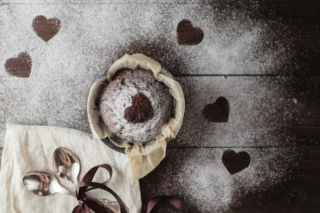 Cookies in the Shape of Heart for Valentine Day on wooden table. Copy space