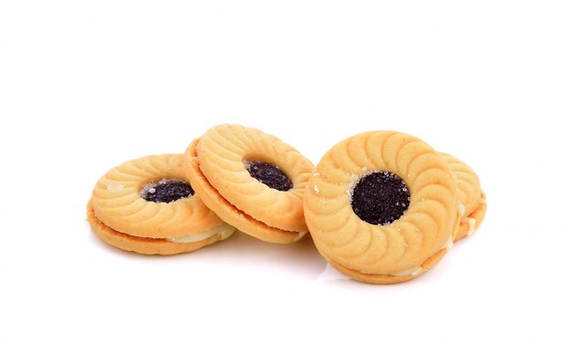 Cookies with blueberry jam on white 