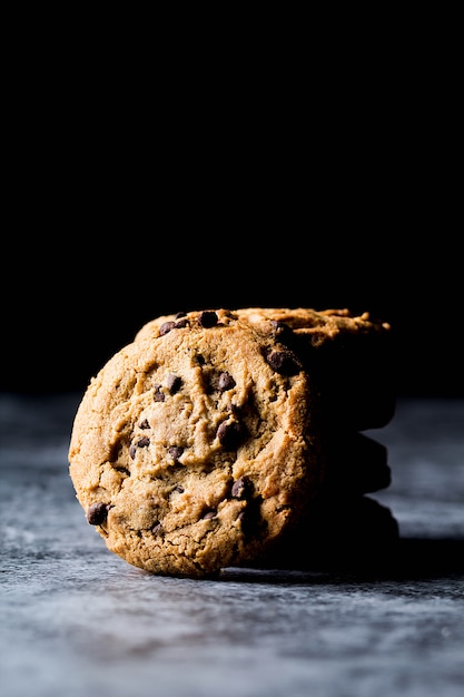 Cookies with chocolate chips in a dark mood