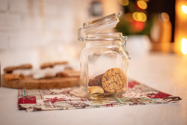 Cookies with chocolate and cinnamon in a glass jar