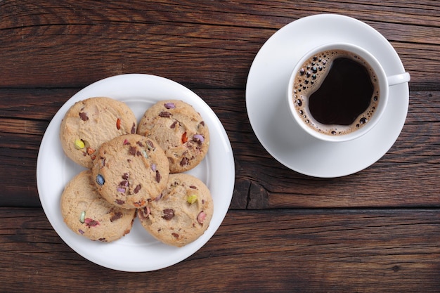 Cookies with chocolate sweets and coffee