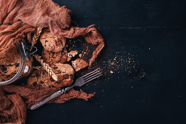 Cookies with chocolate On a wooden background Top view Free space for your text