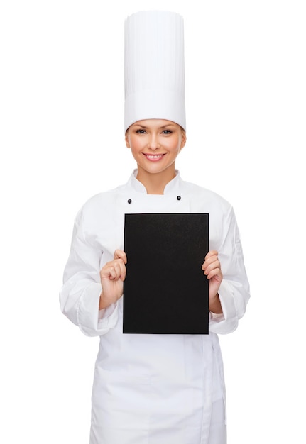 cooking, advertisement and food concept - smiling female chef with blank black paper