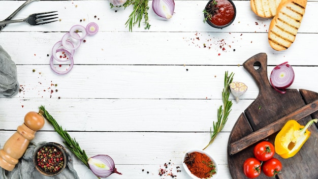 Cooking banner Background with spices and vegetables Top view Free space for your text