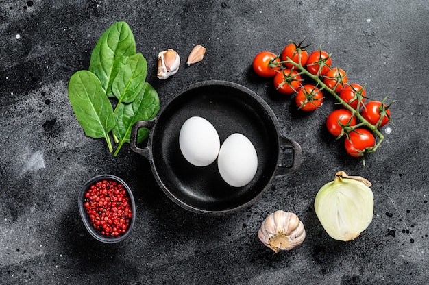 Cooking breakfast with fried or boiled eggs