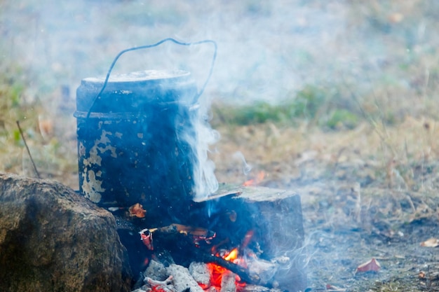 Cooking on campfire in camping