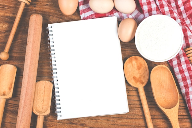 Cooking concept. Basic baking ingredients and kitchen tools close up