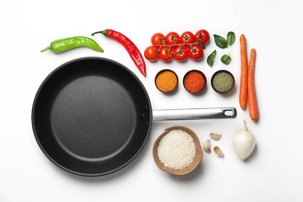 Cooking concept Food ingredients and saucepan on white background