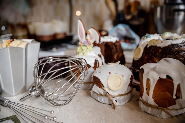 Cooking Easter cakes kulich decorated with sweet sugar icing