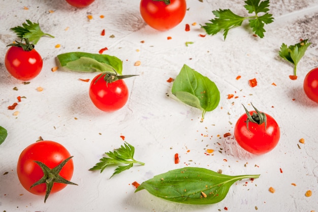 Cooking food surface with tomatoes and greens