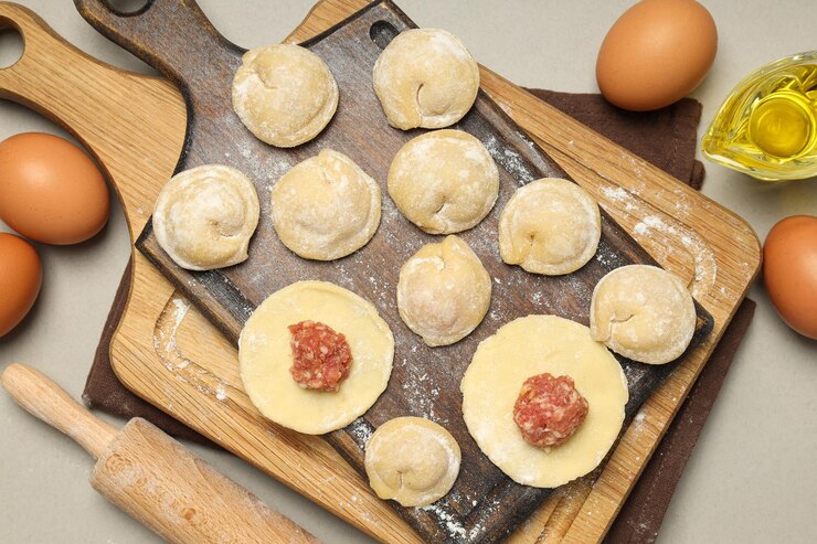 Photo cooking home food concept with raw dumplings